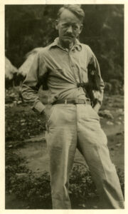 image of J. Alden Mason standing with his hands in his pockets