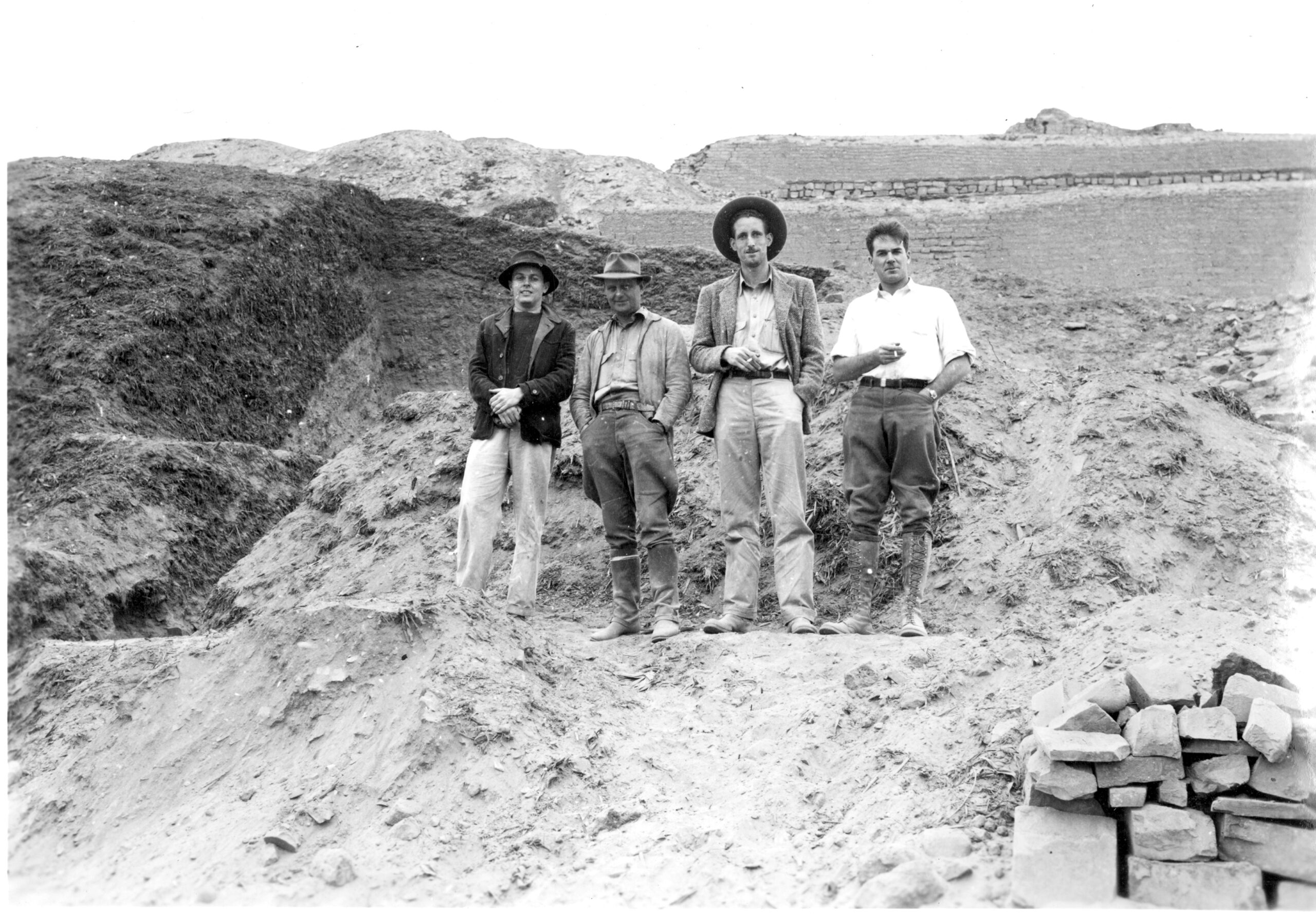 image of 4 men, left to right: Willey, William Duncan Strong, John Corbett, and Marshall (Bud) Newmann at Pachacamac (1941)